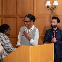 Maya McFarlane receiving her prize in the George Bridgetower room at Trinity Hall