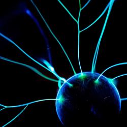 A glowing ball with streams of light flowing outwards